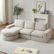 Divano modulare con chaise longue beige in ciniglia; 4 moduli e 3 cuscini