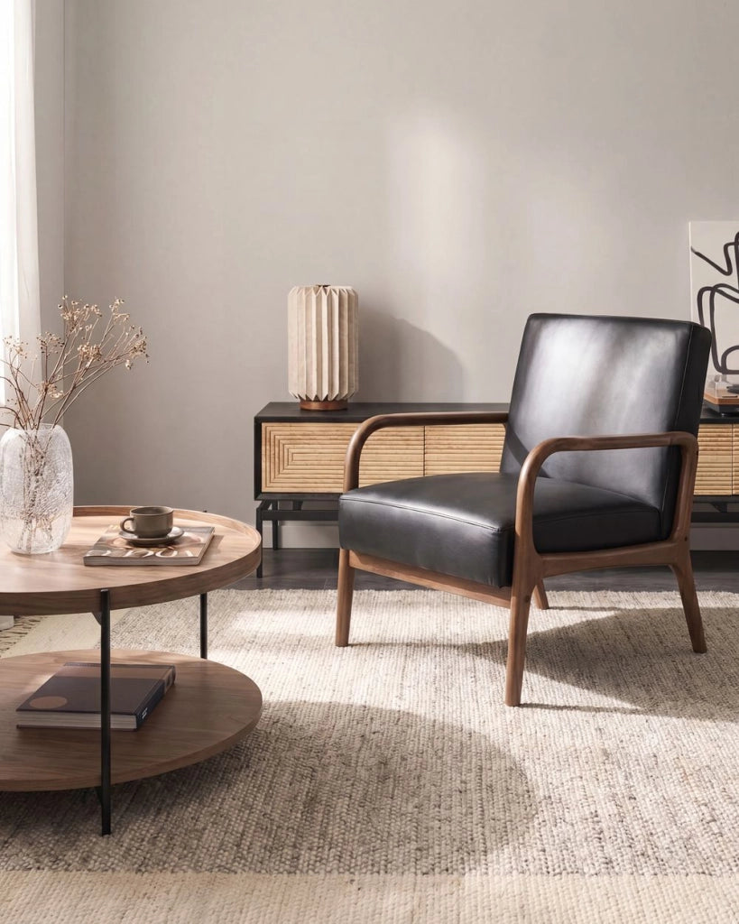 Poltrona in pelle nera con struttura in legno, poltrona lounge retrò in stile Mid-Century Moderno