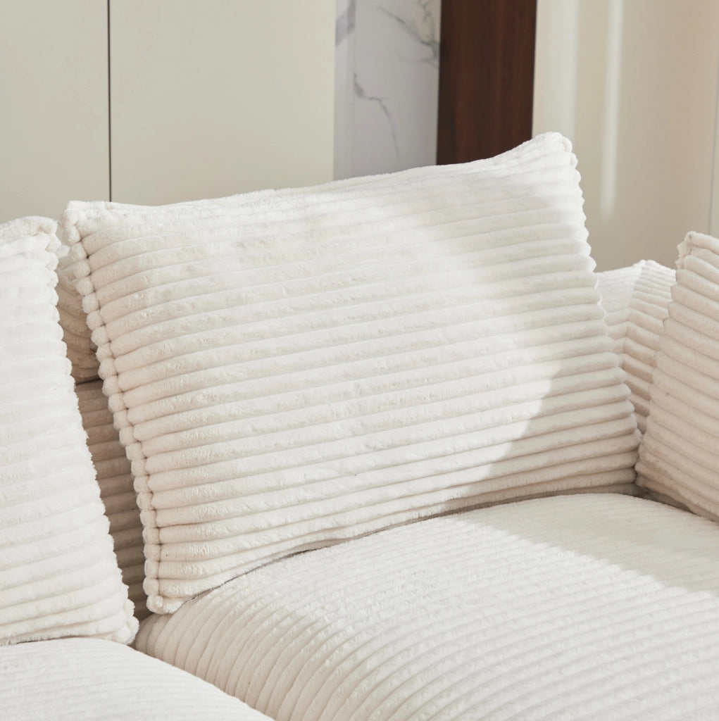 Divano modulare 3 posti in tessuto beige a coste con pouf, cuscini, portabicchieri e tasche laterali