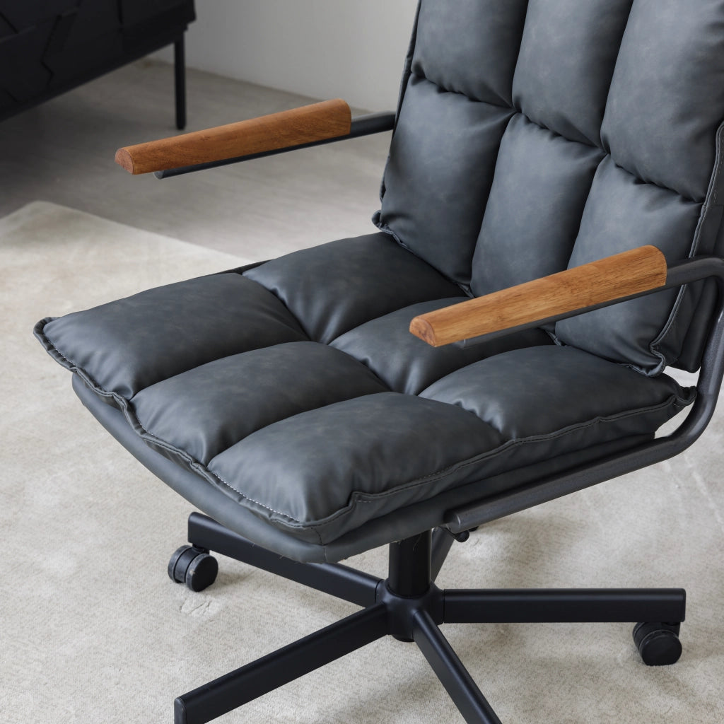 Sedia da ufficio ergonomica girevole 360° regolabile in pelle sintetica e metallo, Nero