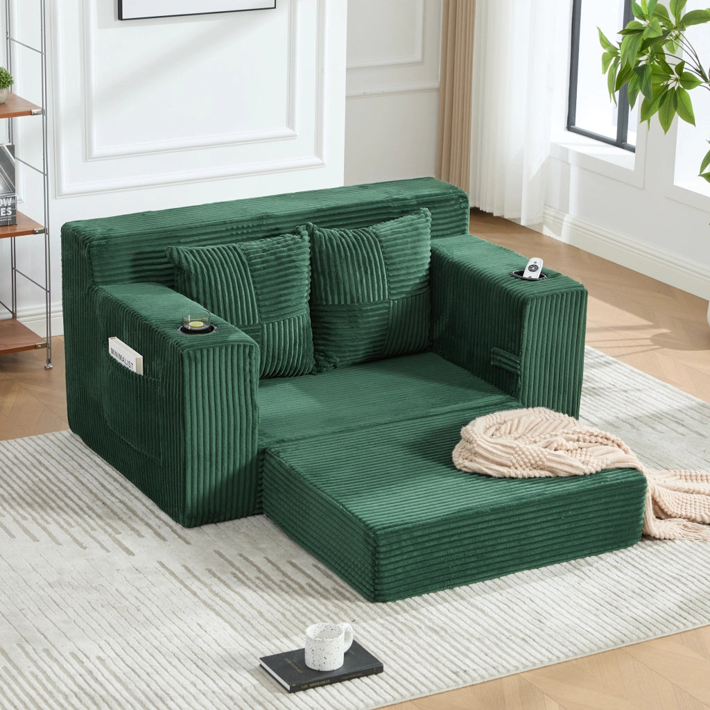 Pouf imbottito in velluto a coste smeraldo con due cuscini braccioli e tasche laterali per relax e lettura