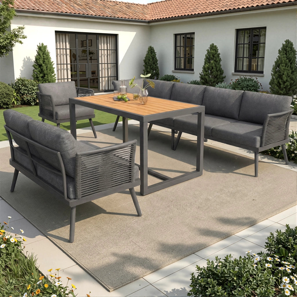 Set lounge da giardino a 7 posti modulare in ferro grigio con tavolino in legno plastico e cuscini sfoderabili