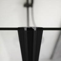 Box doccia 120x70cm con apertura saloon e parete fissa, profili nero opaco e vetro da 6mm trasparente h195 | Elba