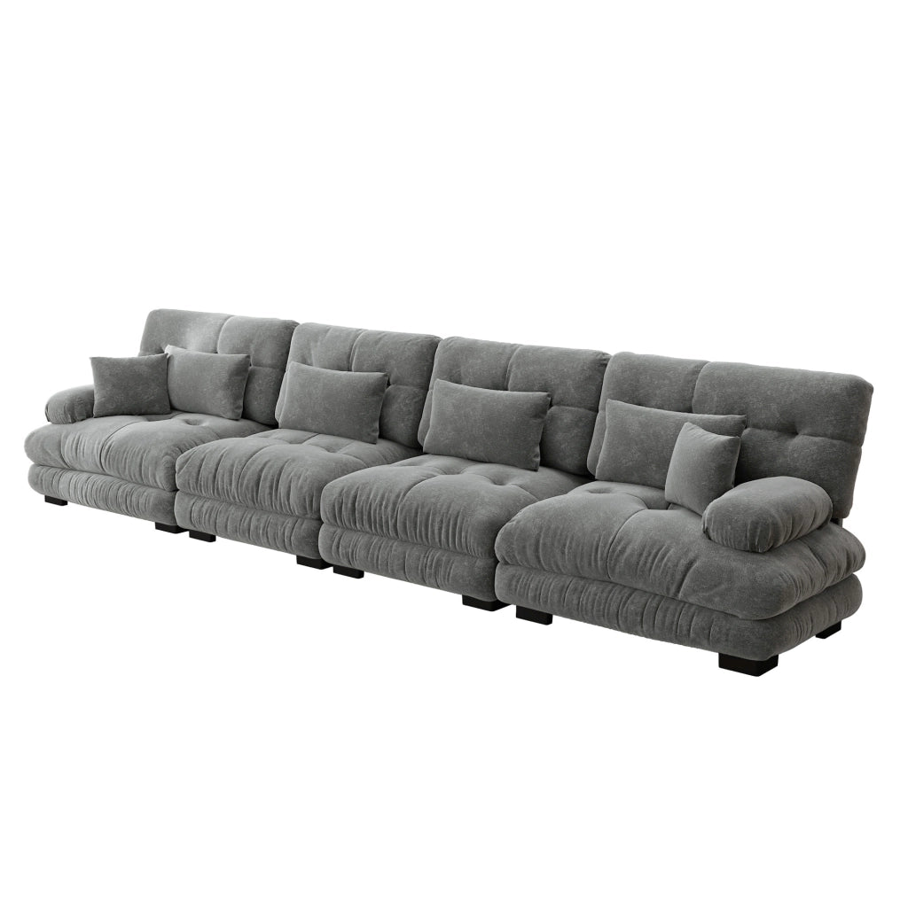 Divano modulare in chenille grigio con seduta profonda e braccioli imbottiti arrotondati