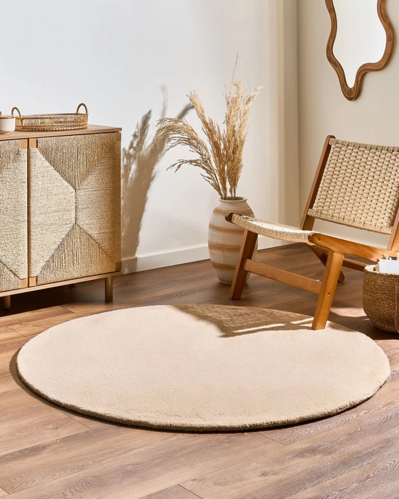 Tappeto in lana beige 140 cm tuftato a mano rotondo design decorativo