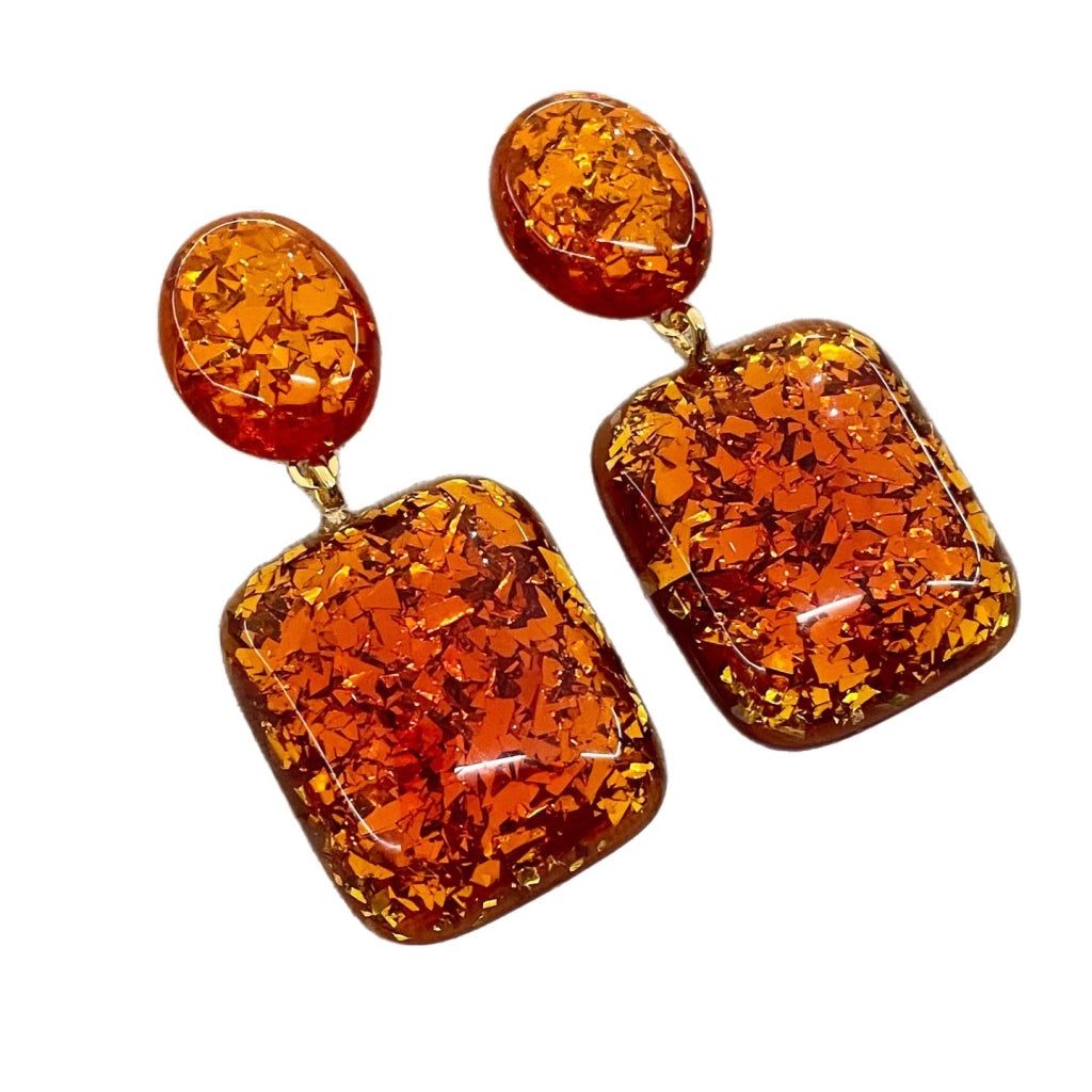 Orecchini quadrati in acrilico arancione con paillettes