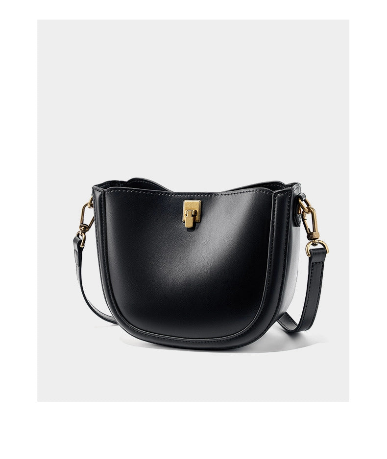 Borsa a mano/a tracolla da donna in pelle di vacchetta Togo, colore nero.
