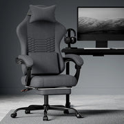 Sedia gaming ergonomica in tessuto nero con poggiatesta; supporto lombare e poggiapiedi