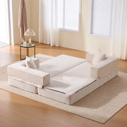 Divano modulare in ciniglia beige con tasche laterali e base antiscivolo