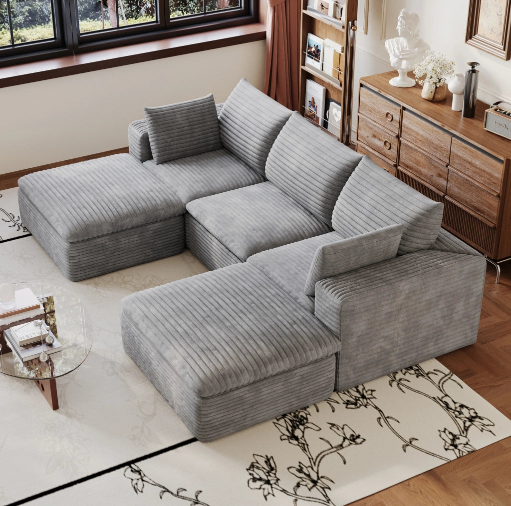 Divano modulare in tessuto grigio con supporto in spugna
