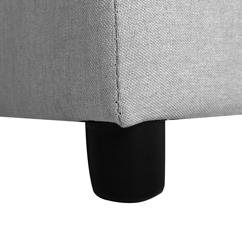 Divano letto ad angolo imbottito in tessuto grigio con orientamento a versione destra con letto contenitore