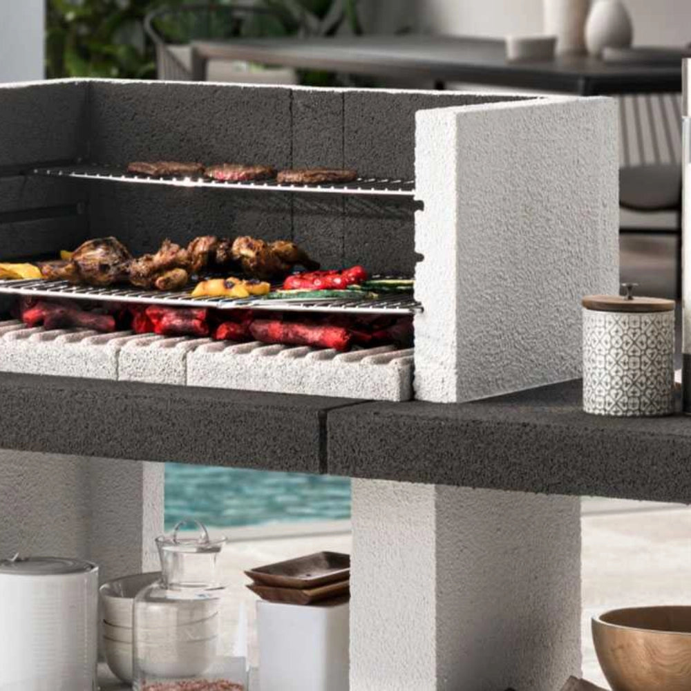 Barbecue in cemento orlando con griglia regolabile e piano d'appoggio