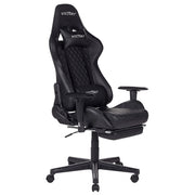 Sedia da gaming con braccioli regolabili in ecopelle nera e poggiapiedi da ufficio altezza regolabile moderno