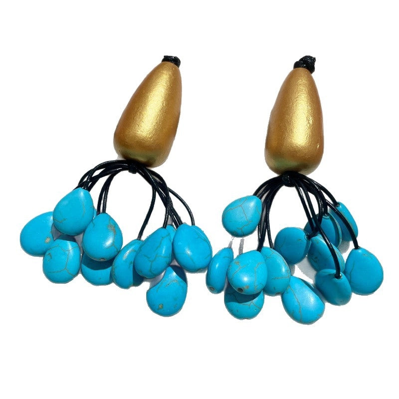 Orecchini a goccia turchese blu, orecchini a goccia in legno color oro, unici e inconfondibili.