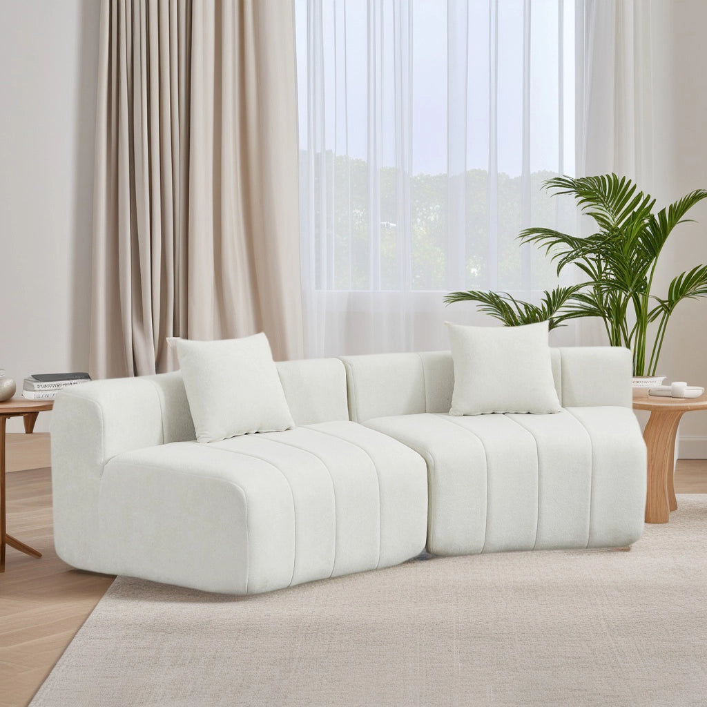 DIVANO Modulare curvo in chenille beige con 2 cuscini
