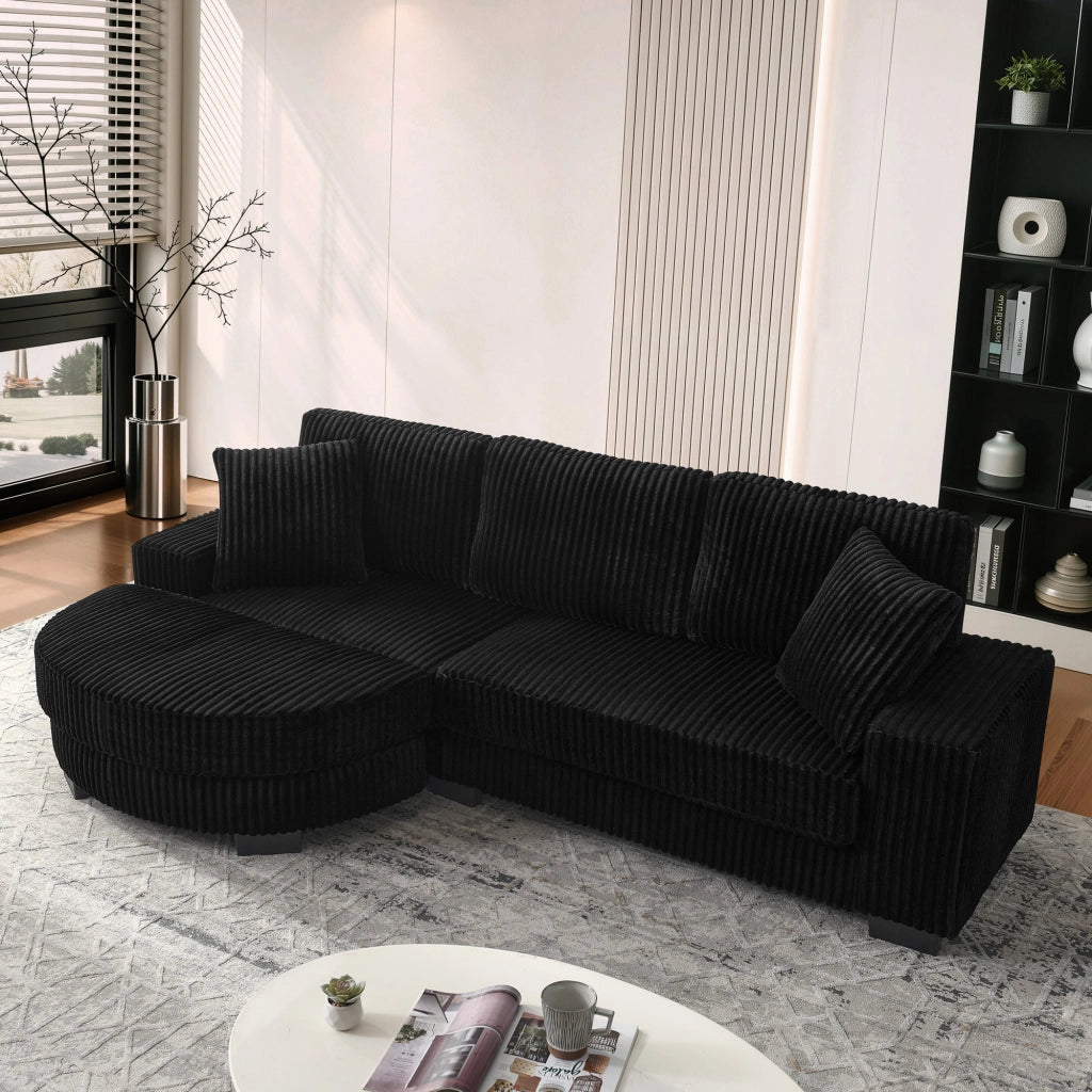 Divano angolare modulare in velluto a coste con pouf ovale reversibile e 2 cuscini nero 256,5 × 133,5 × 89 cm