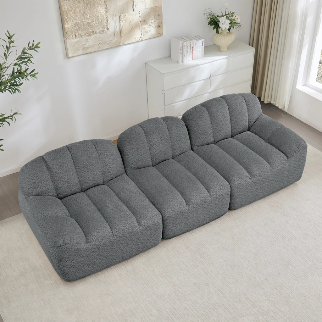 Divano modulare a 3 posti senza struttura con seduta profonda e pouf in pile granulare grigio 288 × 104 × 79 cm