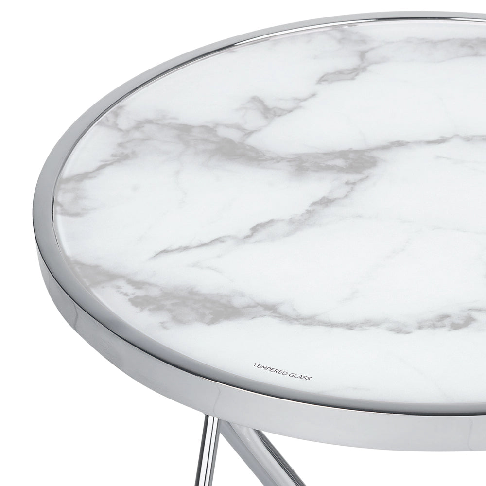 Tavolino Laterale Piano In Vetro Temperato Effetto Marmo Bianco Gambe A Forcella In Metallo Argento Forma Rotonda