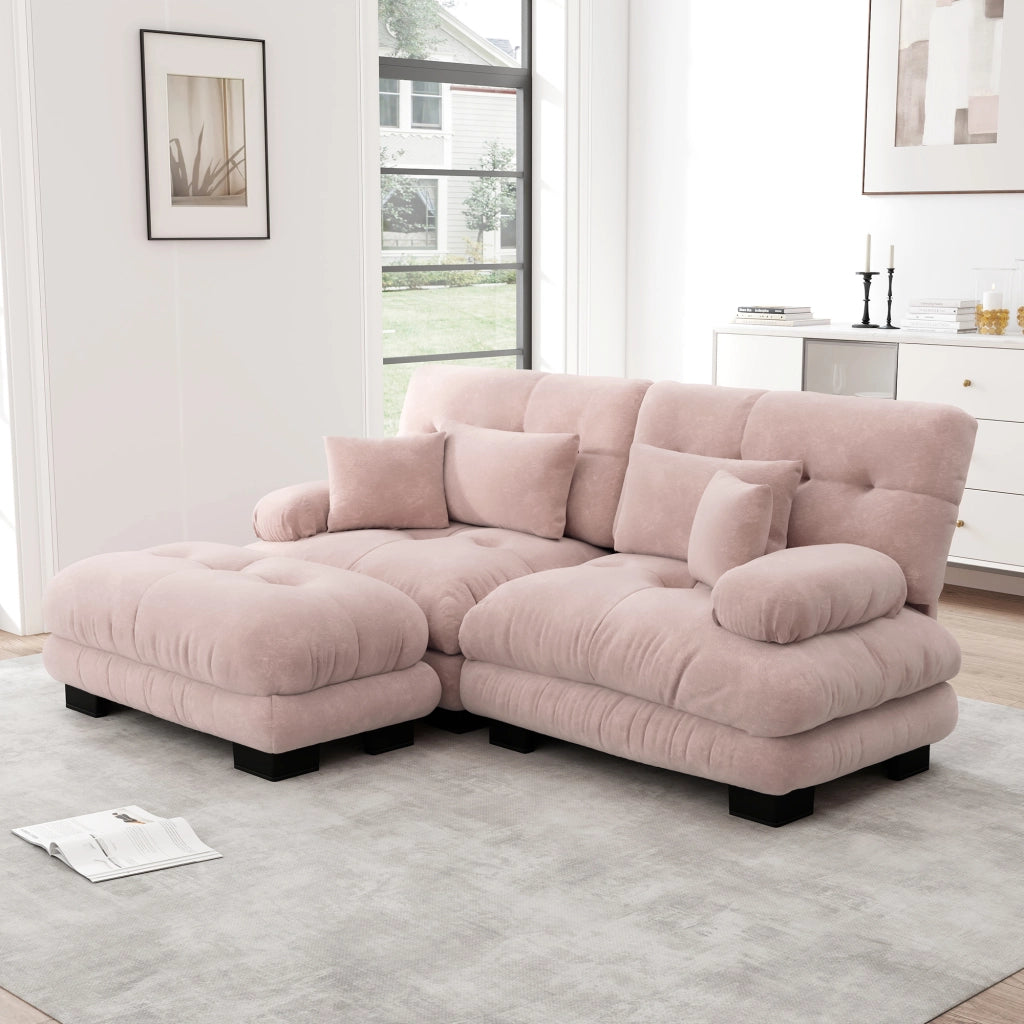 Divano modulare angolare in ciniglia con ottomane mobili; cuscini lombari e decorativi; rosa