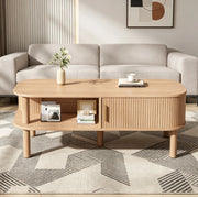 Tavolino da caffè 110x55x45 cm con porta scorrevole e vano portaoggetti in MDF naturale