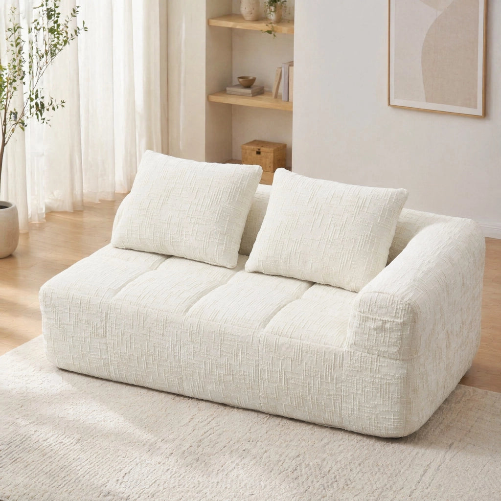 Divano chaise longue in ciniglia beige con tasche laterali e cuscino incluso