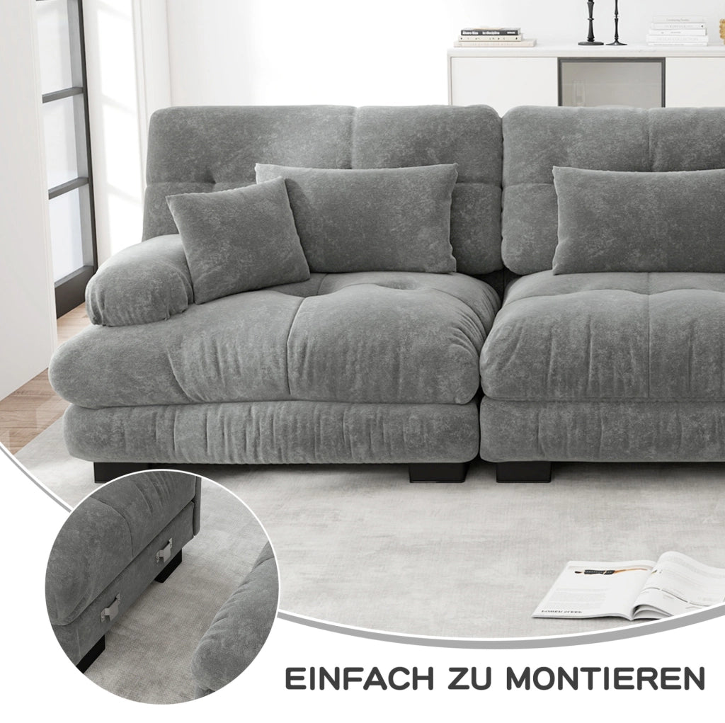 Divano modulare in chenille grigio con seduta profonda e braccioli imbottiti arrotondati
