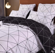 Set di lenzuola moderno e geometrico con chiusura a raccordo, copriletto microfibra a doppia faccia