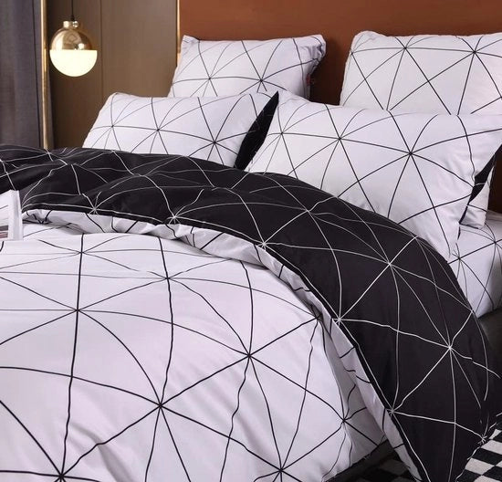 Set di lenzuola moderno e geometrico con chiusura a raccordo, copriletto microfibra a doppia faccia
