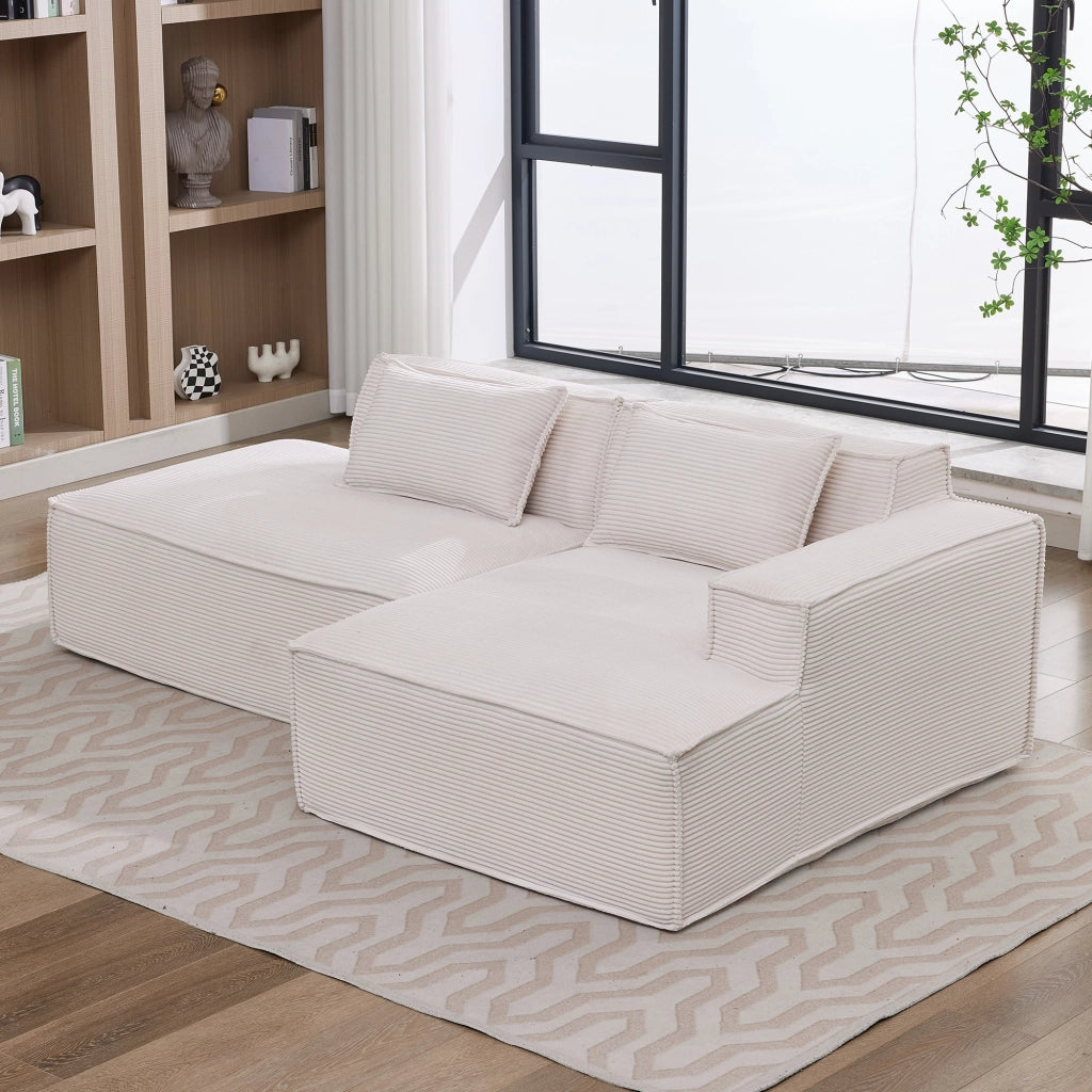 Divano compatto in poliestere con seduta elastica e 2 cuscini per piccoli spazi casa e ufficio beige 235 cm