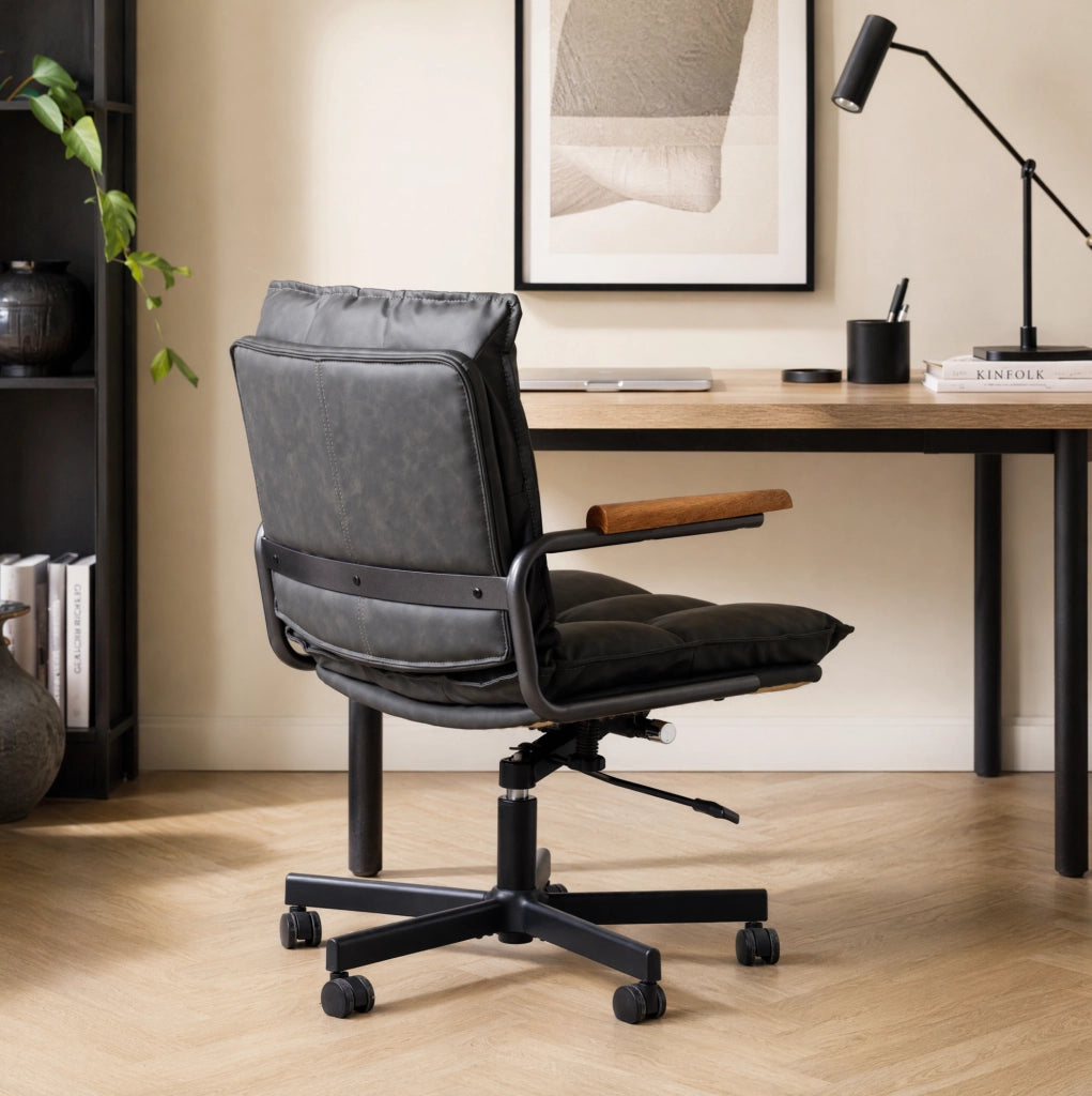 Sedia da ufficio girevole regolabile in similpelle nera; design Mid-Century Modern