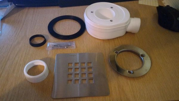 Piletta ultraribassata in PVC per piatto doccia basso con foro diametro da 90 mm - Con tappo tondo Bianco