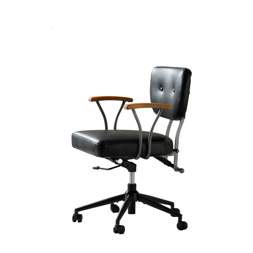 Sedia ufficio ergonomica in pelle nera con ruote girevoli 360° e struttura in metallo