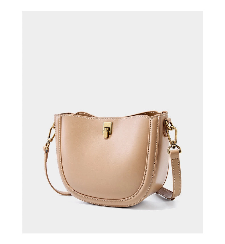 Borsa a mano/a tracolla da donna in pelle di vacchetta Togo, colore bronzo.