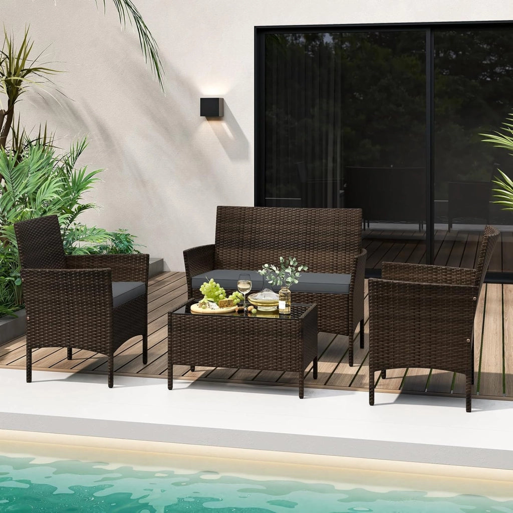 Set di Salotto da Giardino in Rattan 4 Pezzi, Set Mobili da Esterno in Vimini con Cuscini Morbidi, Divanetto e Poltrona con Tavolo in Vetro Temperato per Giardino e Veranda (Grigio)