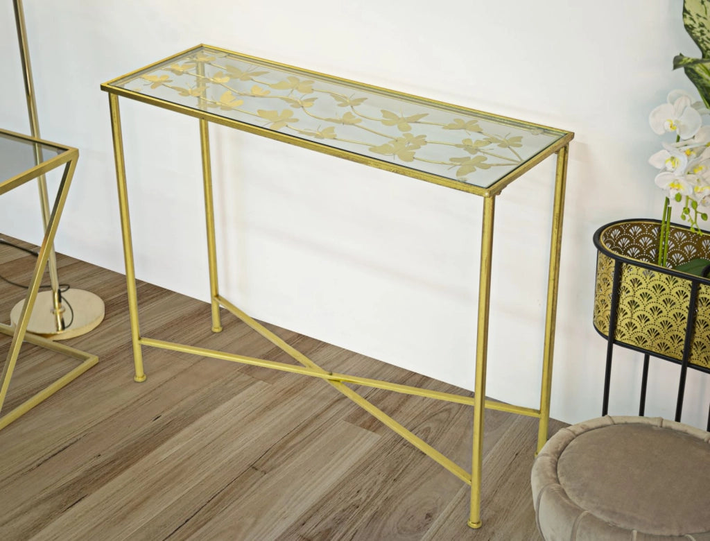 Consolle in metallo dorato, piano in vetro con farfalle 100x35x80cm