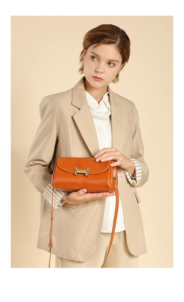 Borsa a tracolla da donna in vera pelle, colore arancione.