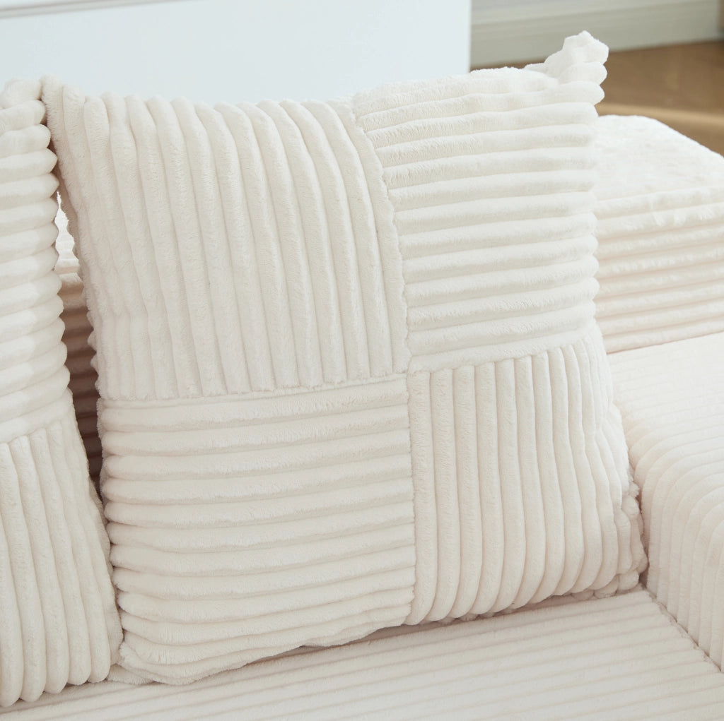Divano pouf in velluto a coste beige con tasche laterali e 2 cuscini HOMVRA
