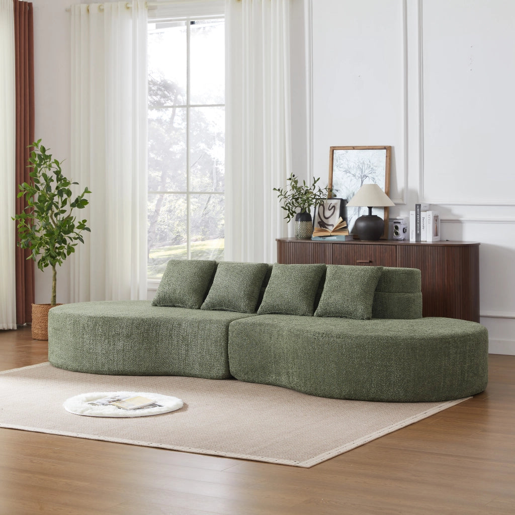 Divano modulare in schiuma con design curvo e schienale a strati, divisibile in due, rivestimento in ciniglia verde