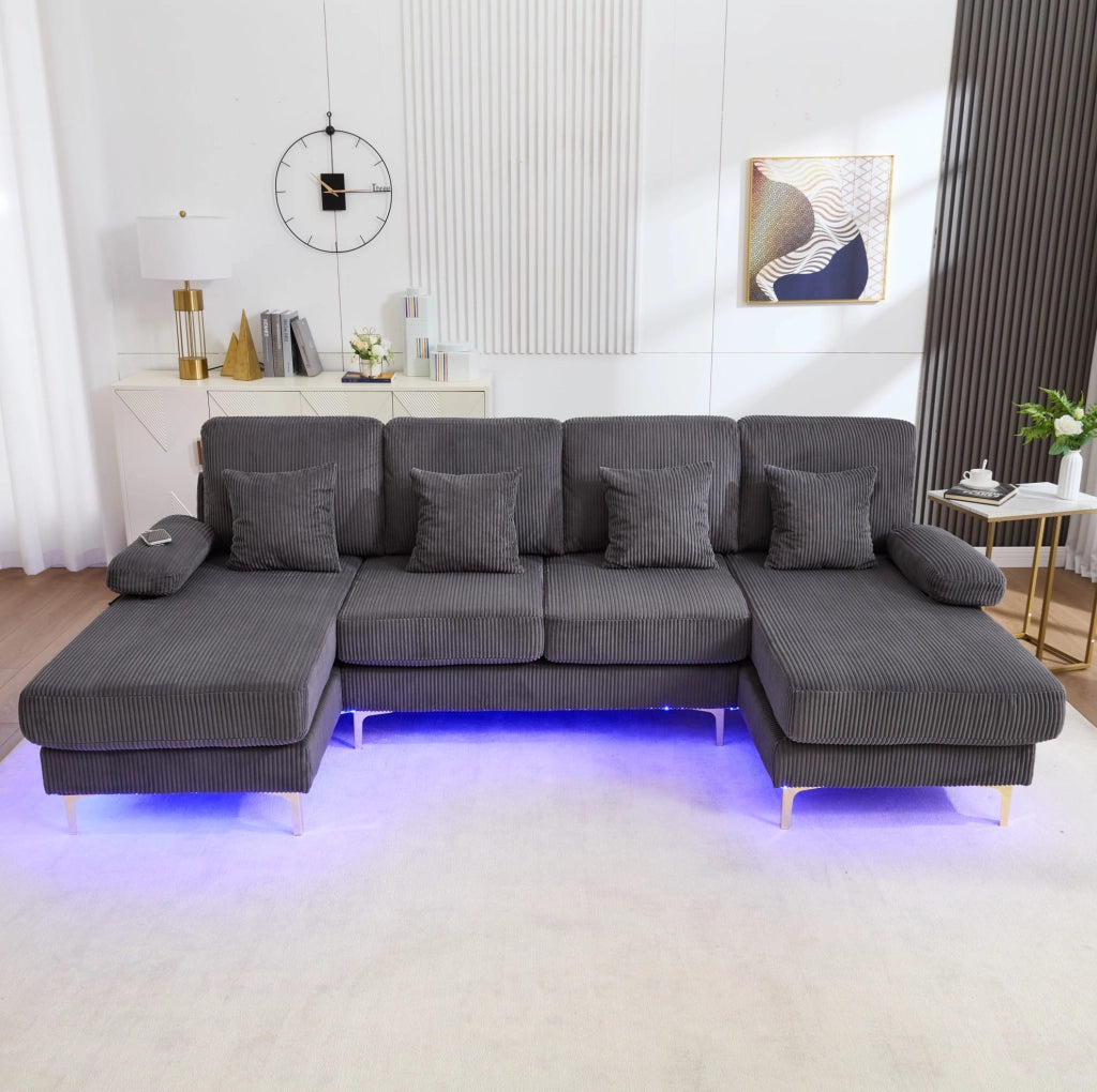 Divano U 265x135x88 cm con LED; USB e cuscini in velluto grigio