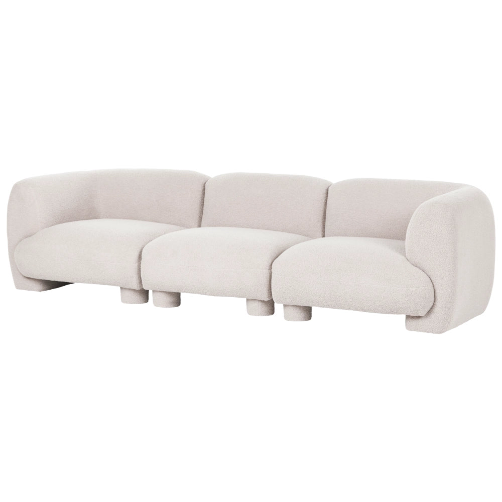 Divano modulare bouclé a tre posti profilo ribassato forma organica bianco sporco