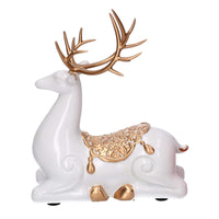 Renna resina seduta oro e bianco cm 17x8xh20