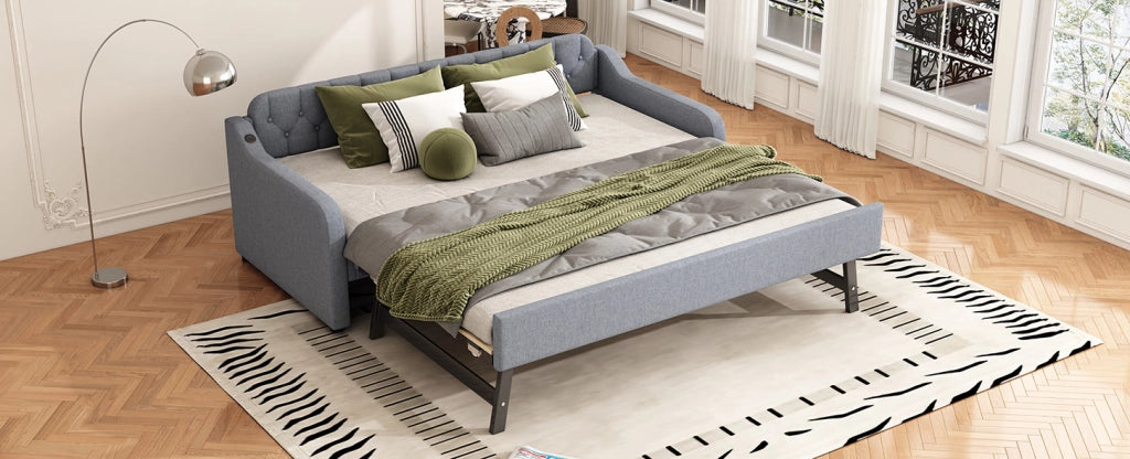 Divano letto grigio 90x200 cm con letto estraibile e porta USB