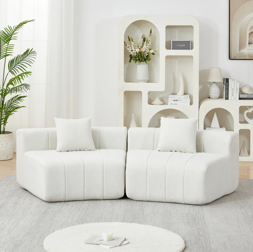 Modulo divano curvo in ciniglia beige con 2 cuscini