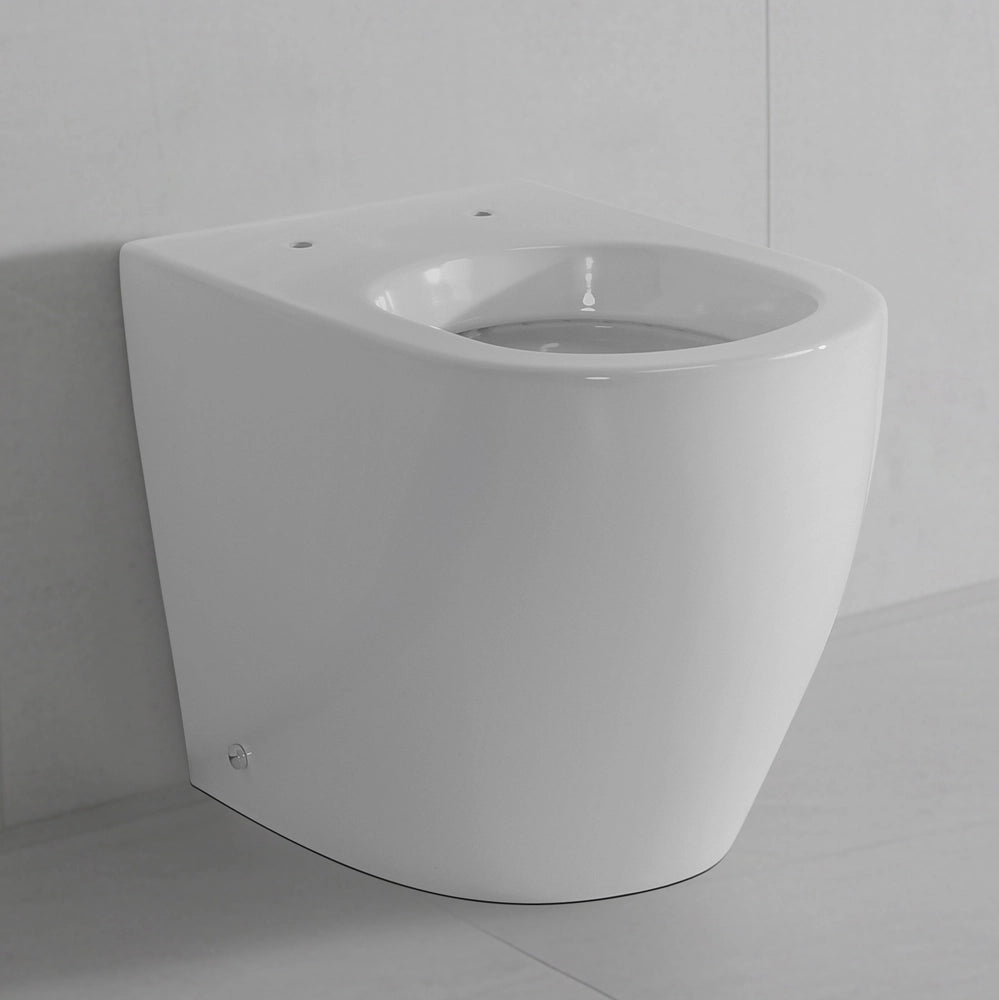 Vaso filo parete traslato in ceramica bianca con scarico universale - Osaka