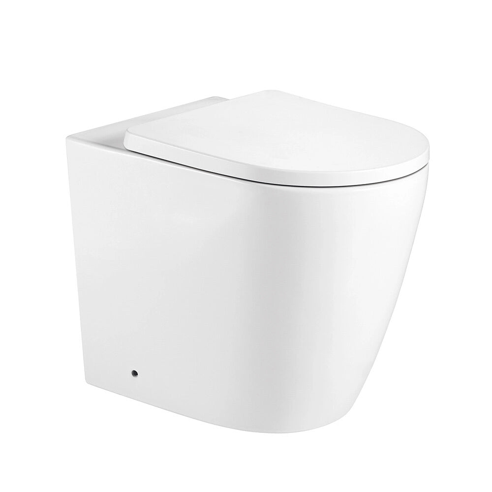 Wc filo muro P 52 cm in ceramica bianca con design ovale e scarico rimless Velora