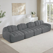 Divano angolare modulare a 4 posti in fleece granulare grigio con seduta ampia e braccioli ergonomici