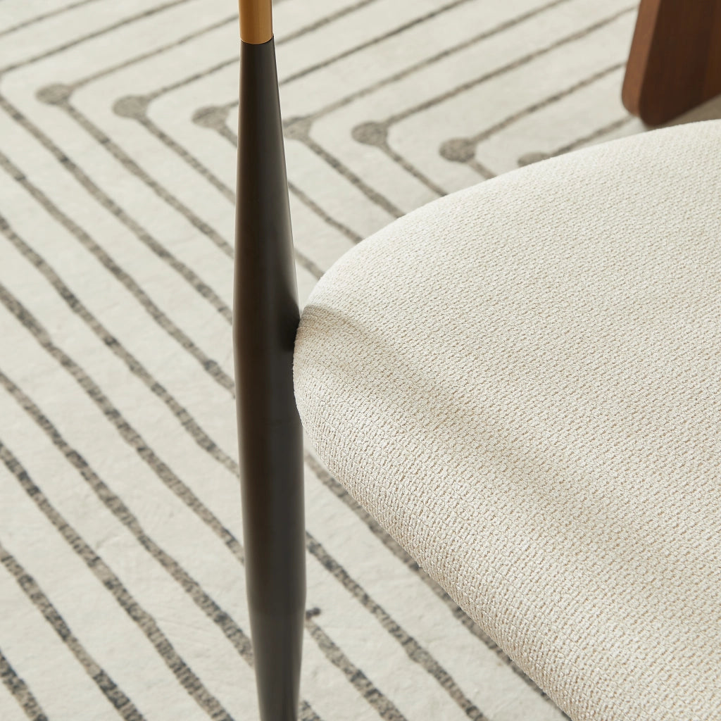 Sedia da pranzo con cuscini in tessuto; altezza regolabile e struttura in metallo nero e oro; beige