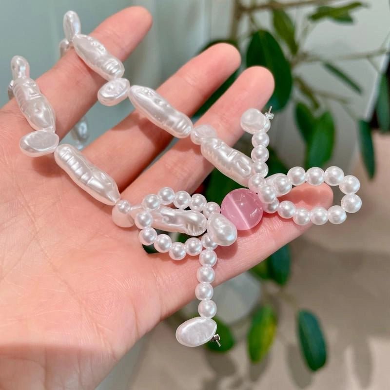 Collana con fiocco di perle rosa fatta a mano, regalo di Natale o di compleanno.