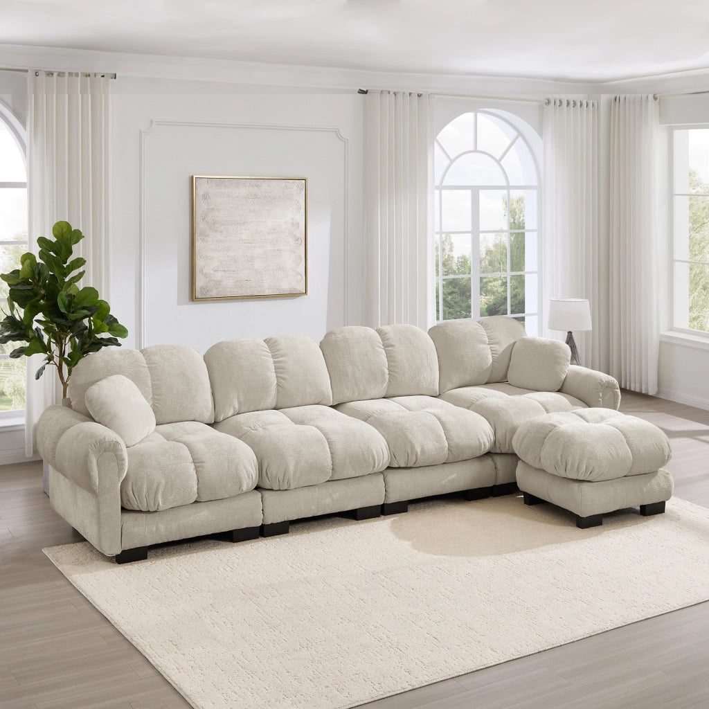 Divano angolare modulare 4 posti in ciniglia con pouf mobile e cuciture trapuntate per soggiorno beige chiaro