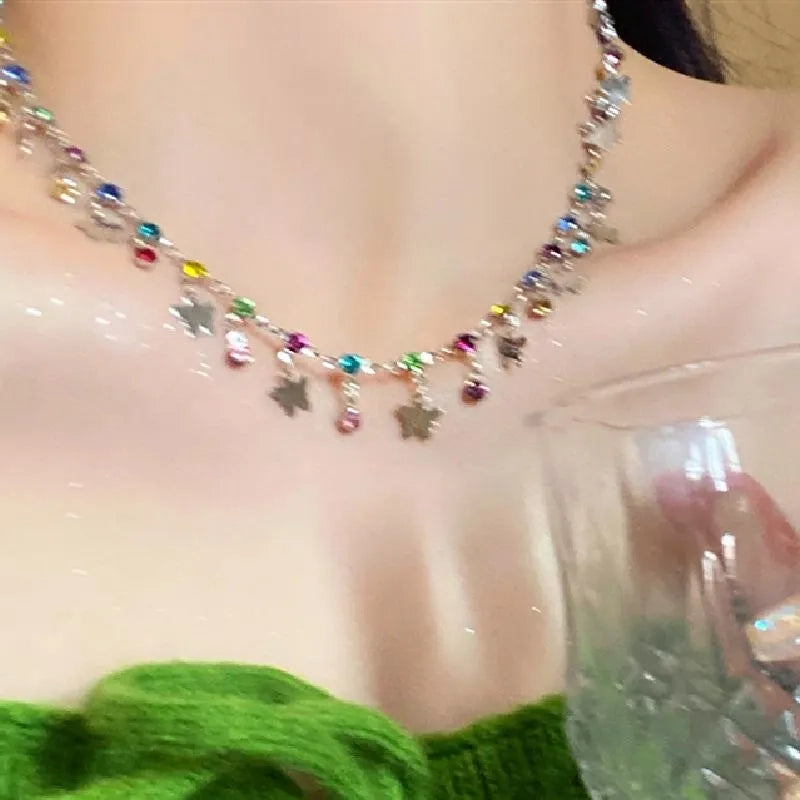 Collana a farfalla e stella realizzata a mano con perline: ciondolo con zirconi colorati